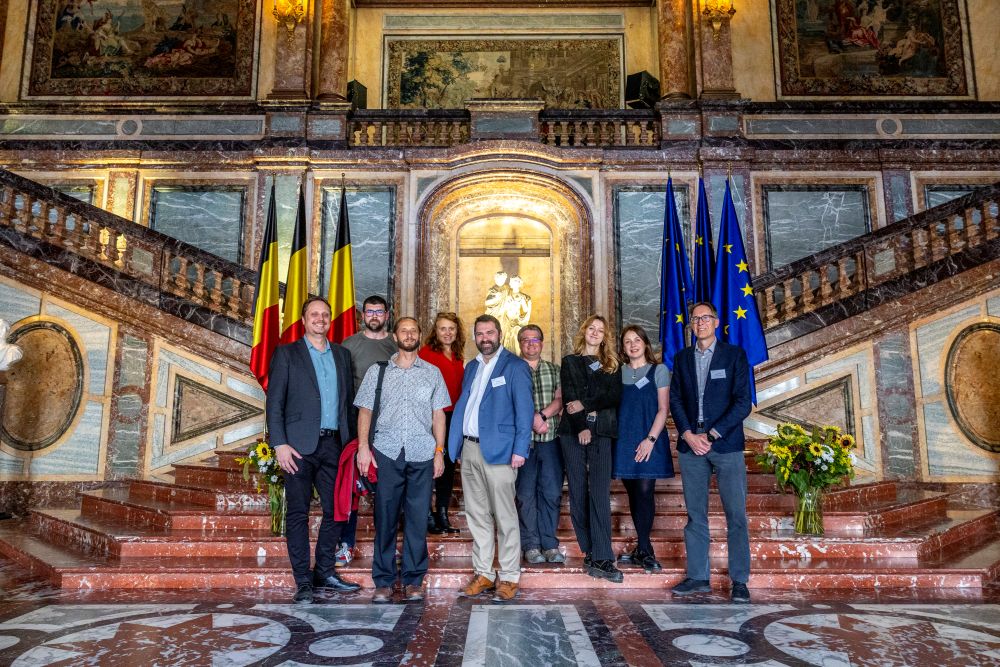 The New Zealand delegation on the steps in the Royal Palace of Brussels.